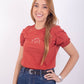 Camiseta terracota manga bombacha estampada